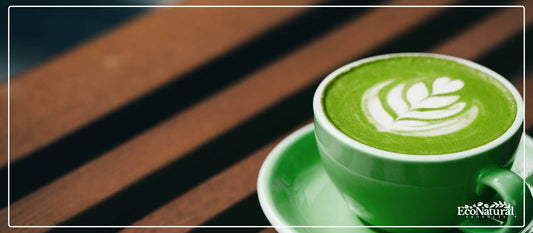 Matcha green tea powder with a bamboo whisk