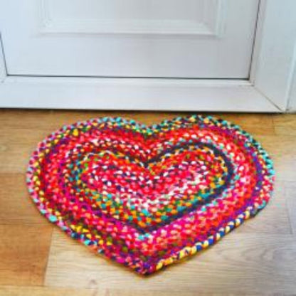Shared Earth eco doormat in heart design – colourful recycled cotton blend and sustainable jute base.