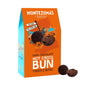Montezumas chocolate Dark Chocolate Hot Cross Bun Truffle Bites Easter 120g front packaging with the actual product