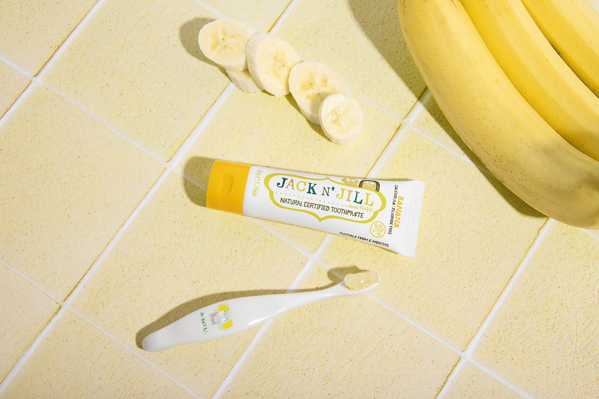Jack N' Jill Banana kids toothpaste tube with sliced bananas