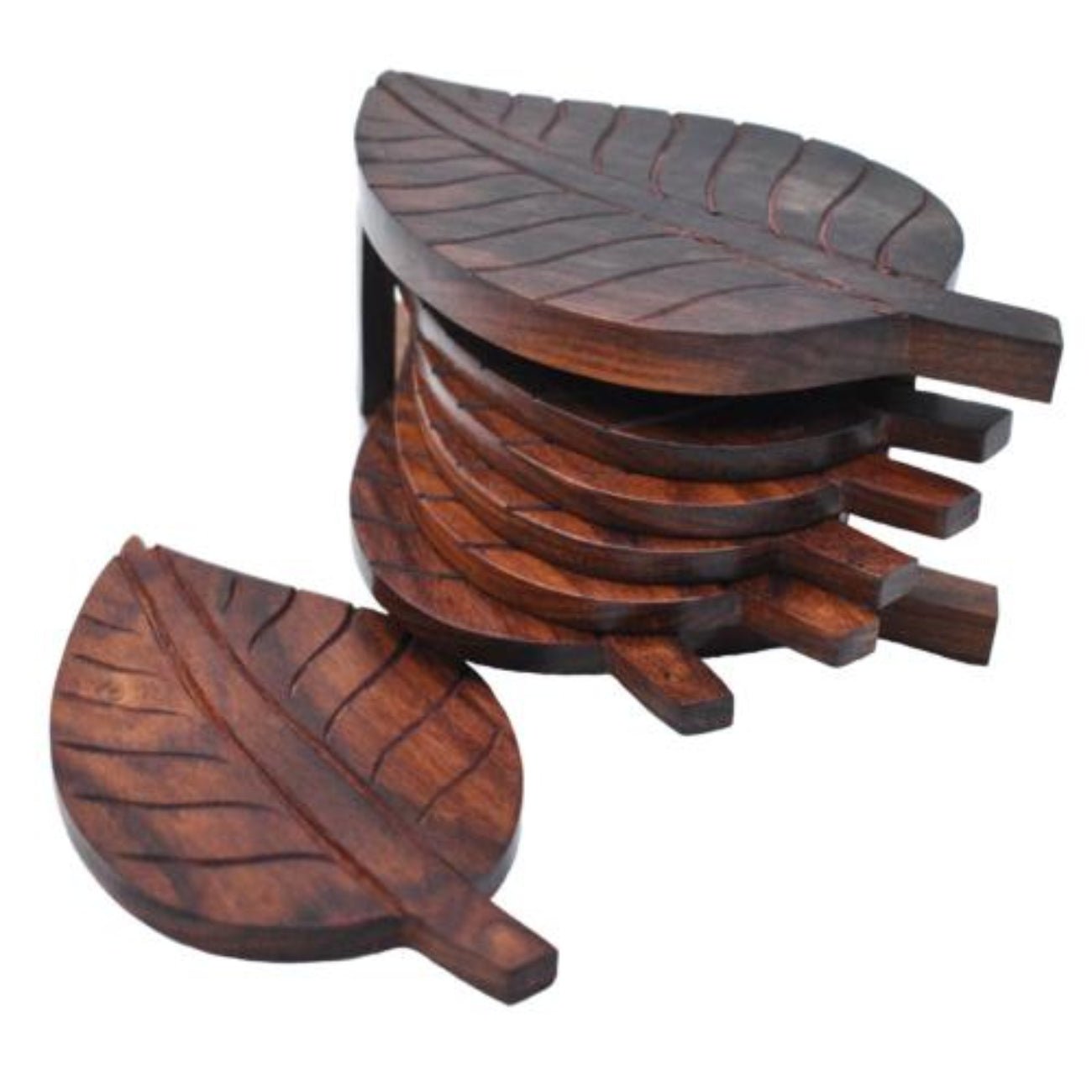"Leaf shaped coasters in Sheesham wood with etched design – handcrafted and sustainably sourced from India.