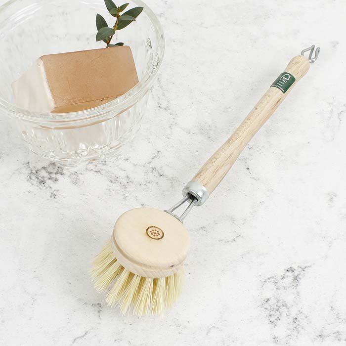 A Slice of Green Wooden Dish Brush — replaceable head, plant-based bristles
